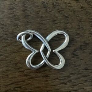 James Avery retired butterfly hearts pendant in excellent condition.